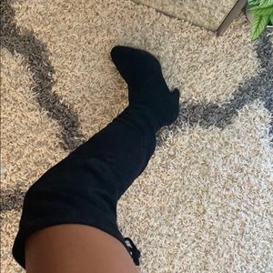 Tall black boots